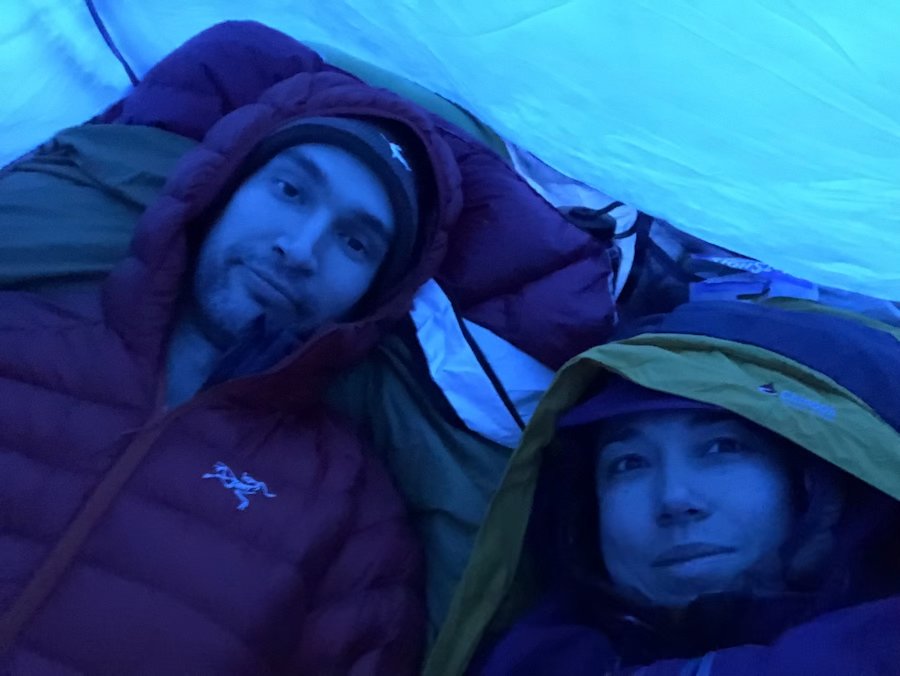 Bunkering down for the night in our tent on a cold, snowy night in Mount Baker-Snoqualmie National Forest