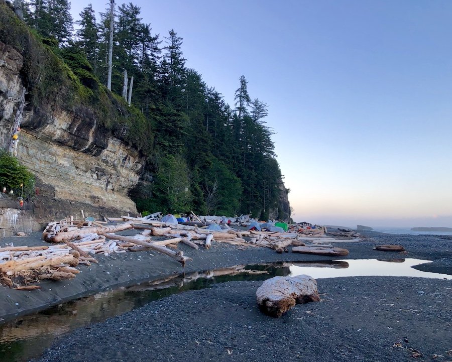 Tsusiat Falls camp area in early morning on the West Coast Trail