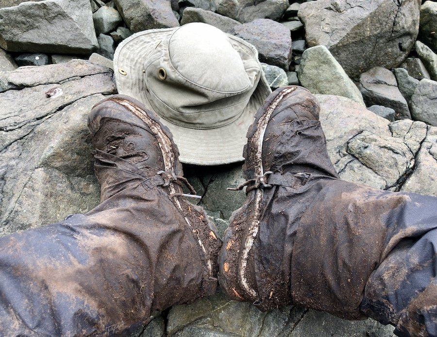 Muddy boots from hiking the North Coast Trail