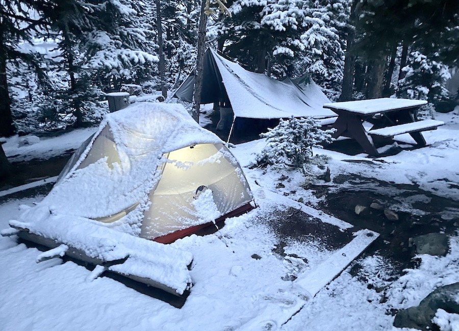 Snowy campsite at Quiniscoe Lake campground, Cathedral Provincial Park