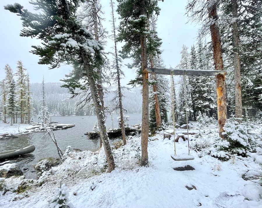Snowy swing view at Cathedral Lakes Lodge, Cathedral Provincial Park