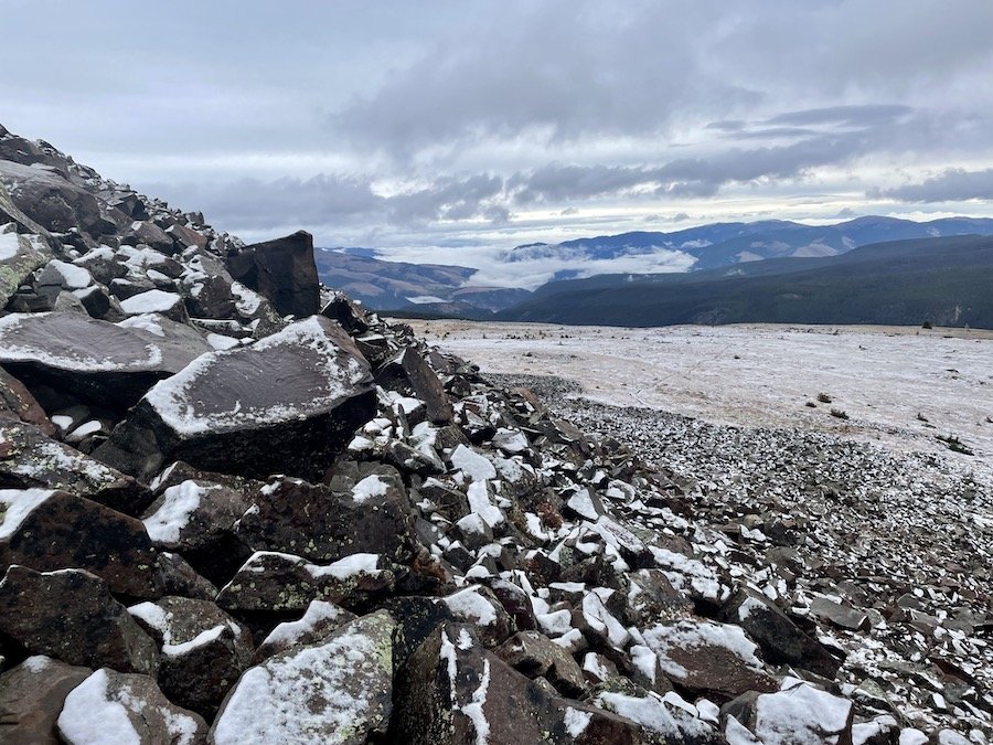 Looking back on snowy boulder field on RimTrail, Cathedral Provincial Park